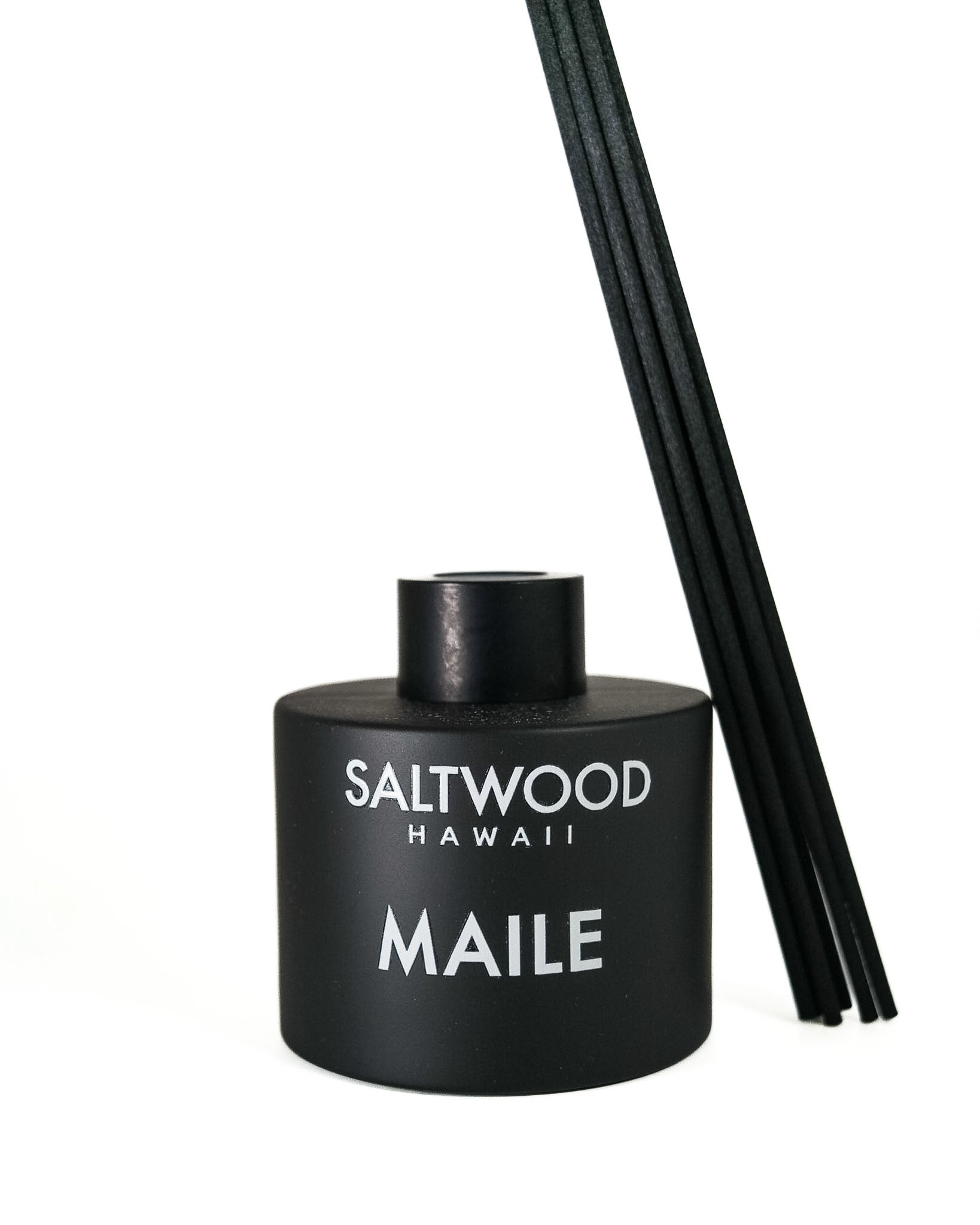 Black Saltwood Hawaii Maile diffuser with black reeds on a white background